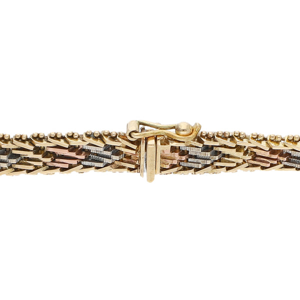 Pulsera eslabón combinado en oro tres tonos 14 k.