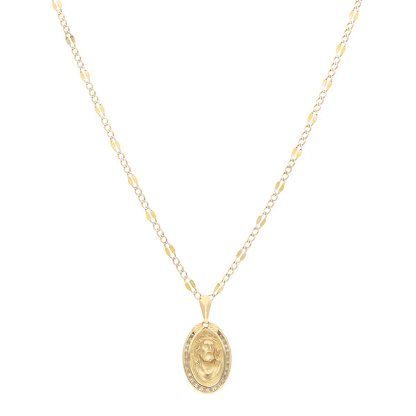 Collar eslabón combinado platinado y medalla motivo Divino Rostro con sintéticos en oro amarillo 14 kilates.