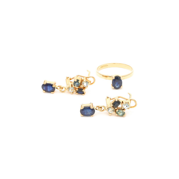 Juego de anillo y aretes diseño especial con zafiros en oro amarillo 14 kilates.