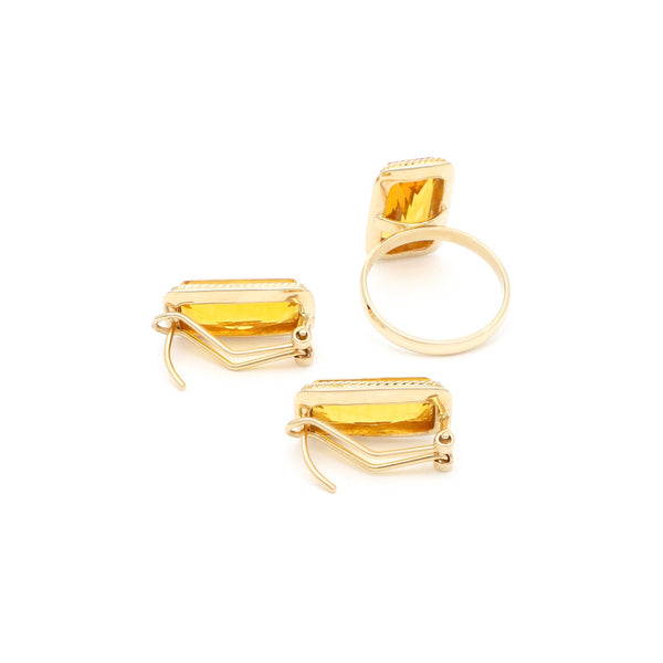 Juego de anillo y aretes diseño especial con citrinos en oro amarillo 14 kilates.