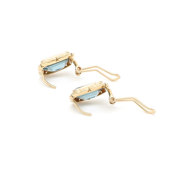 Aretes calados con aguamarina en oro amarillo 14 kilates.