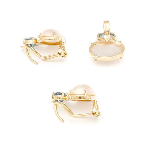 Juego de dije y aretes diseño especial con blue London y media perla en oro amarillo 14 kilates.