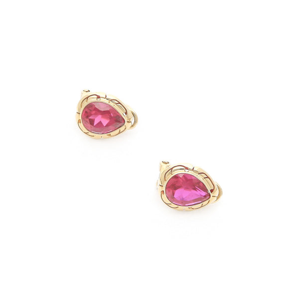 Aretes calados con rubíes en oro amarillo 14 kilates.