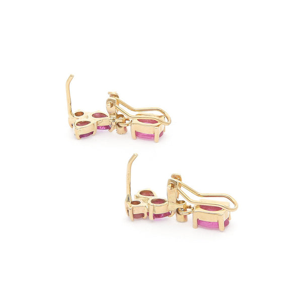 Juego de anillo y aretes diseño especial con diamantes y zafiro rosa en oro amarillo 14 kilates.