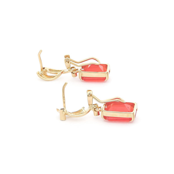 Juego de anillo y aretes diseño especial con diamantes y jacintos en oro amarillo 14 kilates.