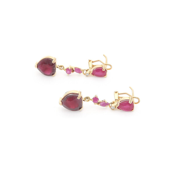 Aretes diseño especial con colgantes, diamantes y rubíes en oro amarillo 14 kilates.