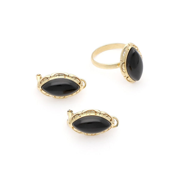 Juego de anillo y aretes calados en oro amarillo 14 kilates.