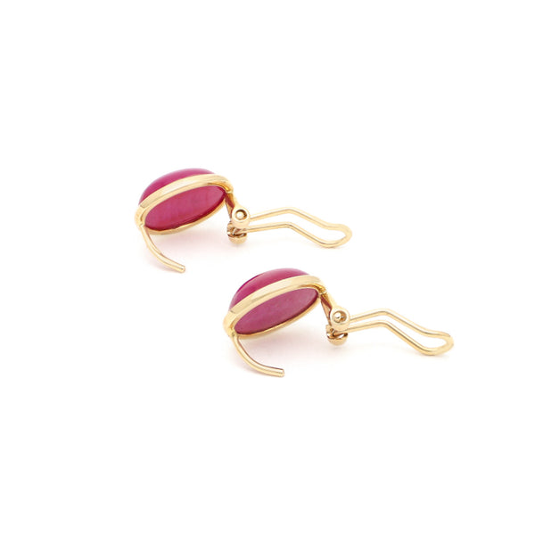 Aretes diseño especial con rubíes en oro amarillo 14 kilates.
