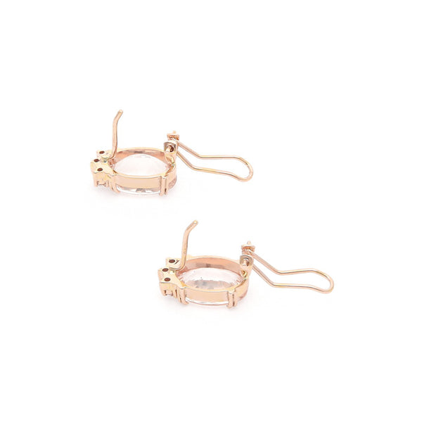 Juego de anillo y aretes diseño especial con diamantes y morganitas en oro rosa 14 kilates.