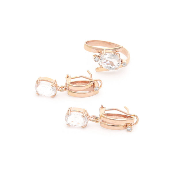Juego de anillo y aretes diseño especial con diamantes y morganitas en oro rosa 14 kilates.