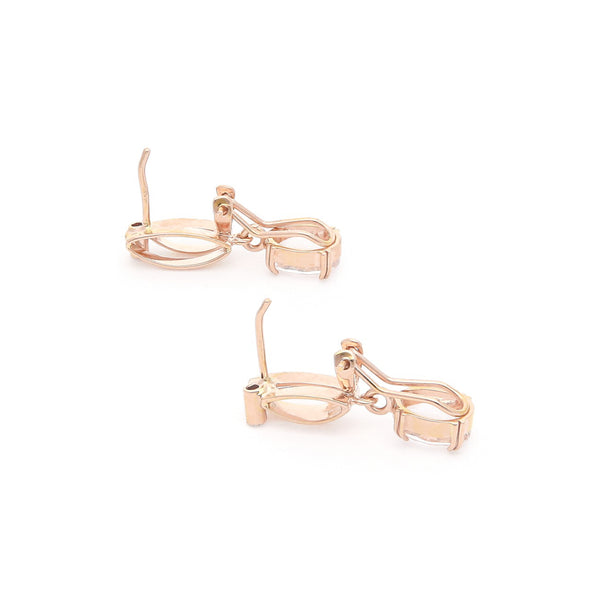 Juego de anillo y aretes diseño especial con diamantes y morganitas en oro rosa 14 kilates.