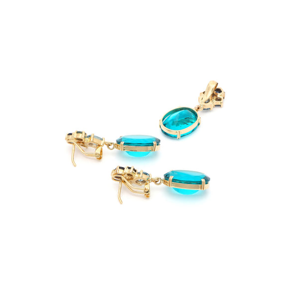 Juego de dije y aretes diseño especial con obsidiana en oro amarillo 14 kilates.