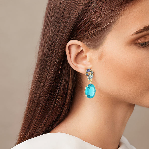 Juego de dije y aretes diseño especial con obsidiana en oro amarillo 14 kilates.