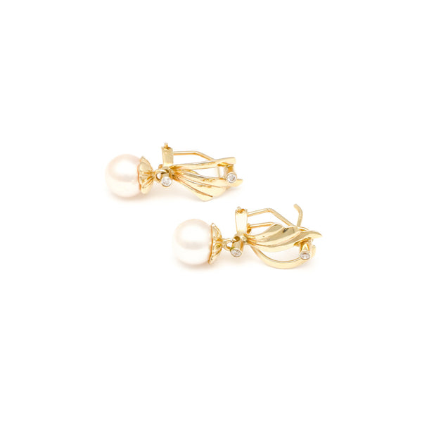 Aretes diseño especial con colgantes, perlas y sintéticos en oro amarillo 14 kilates.