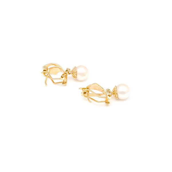 Aretes diseño especial con colgantes, perlas y sintéticos en oro amarillo 14 kilates.