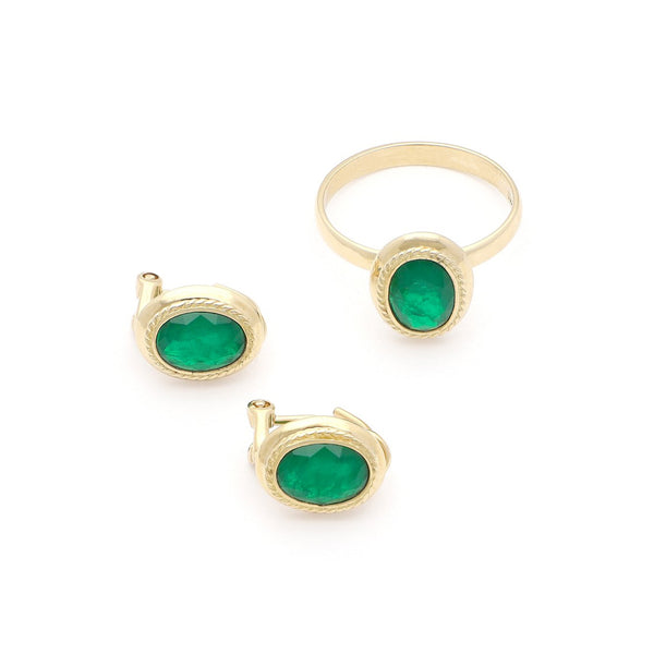 Juego de anillo y aretes diseño especial con esmeraldas en oro amarillo 14 kilates.
