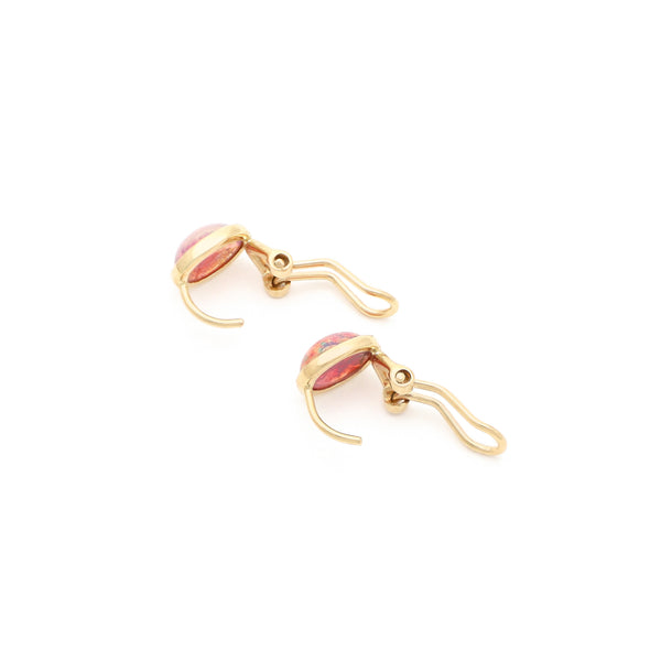 Juego de anillo y aretes diseño especial con ópalo en oro amarillo 14 kilates.