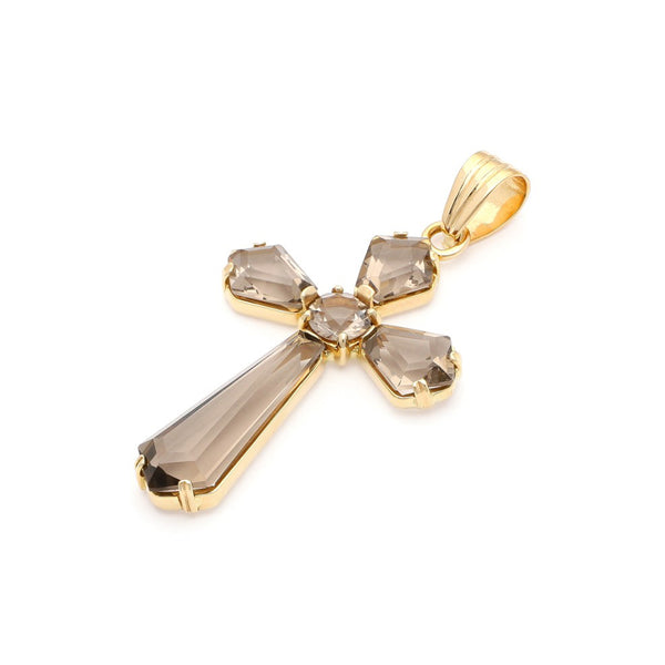 Cruz diseño especial con topacios en oro amarillo 14 kilates.