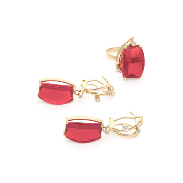 Juego de anillo y aretes diseño especial con rubíes y sintéticos en oro amarillo 14 kilates.