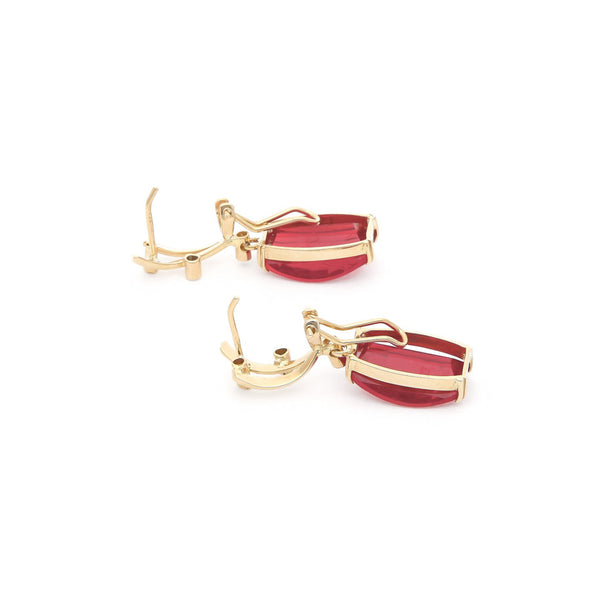 Juego de anillo y aretes diseño especial con rubíes y sintéticos en oro amarillo 14 kilates.