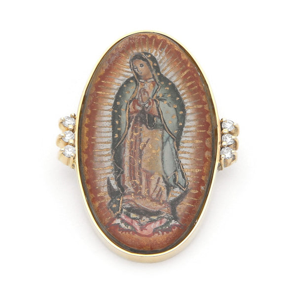 Medalla diseño especial con madre perla, sintéticos y esmalte motivo Virgen de Guadalupe en oro amarillo 14 kilates.
