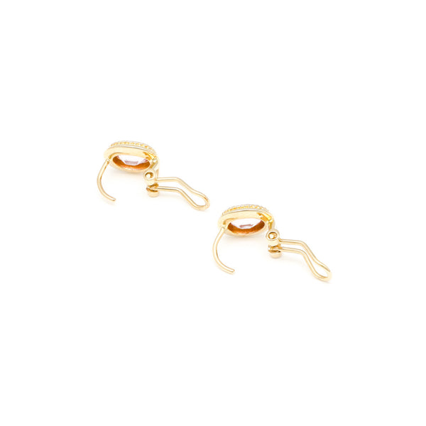 Juego de anillo y aretes torzal con Rosa de Francia en oro amarillo 14 kilates.