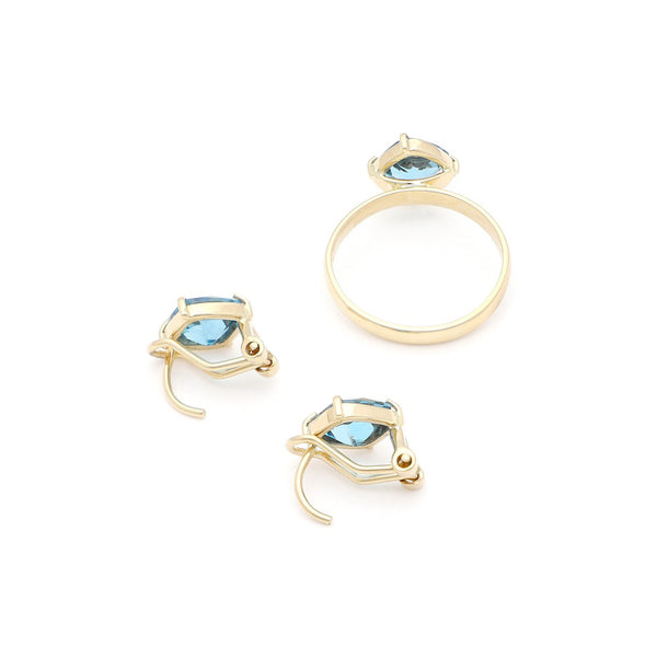 Juego de anillo y aretes con Sky Blue en oro amarillo 14 kilates.