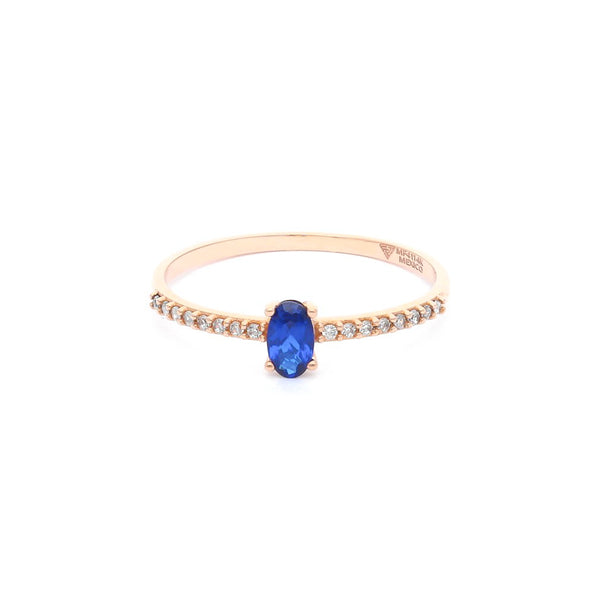 Anillo diseño especial con sintéticos en oro rosa 14 kilates.