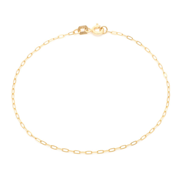 Pulsera eslabón cruzado en oro amarillo 14 kilates.