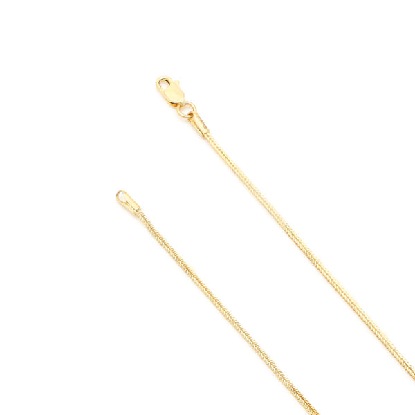 Pulsera eslabón tipo espiga en oro amarillo 14 kilates.