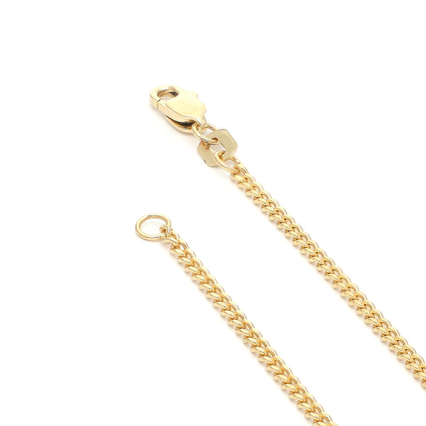 Pulsera eslabón barbado en oro amarillo 14 kilates.