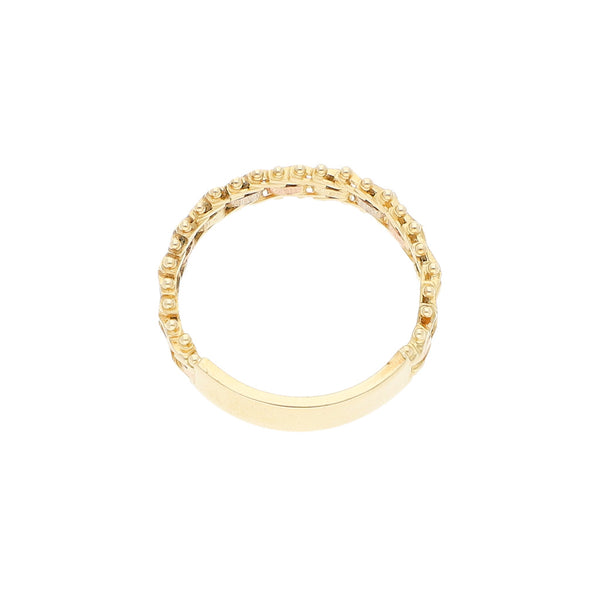 Anillo boleado en oro tres tonos 14 kilates.
