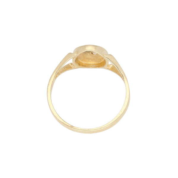 Anillo labrado con sintético en oro amarillo 14 kilates.