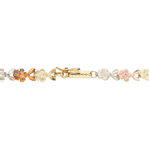 Pulsera eslabón articulado en oro tres tonos 14 kilates.