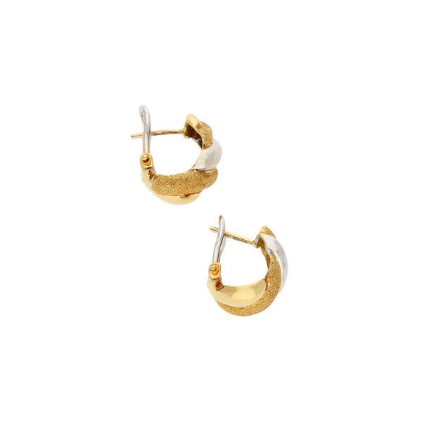 Aretes diseño especial en oro dos tonos 14 kilates.