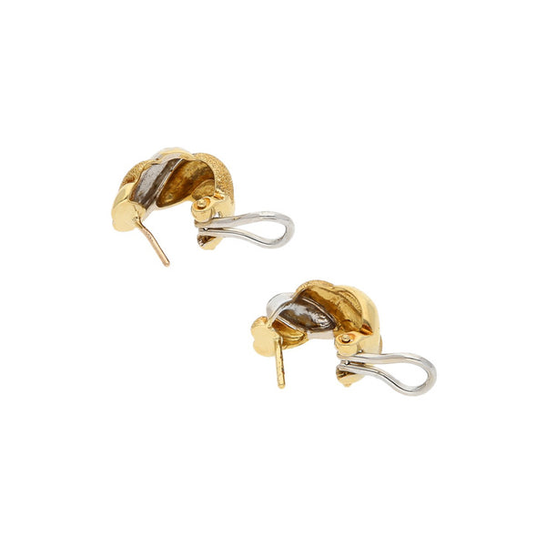 Aretes diseño especial en oro dos tonos 14 kilates.