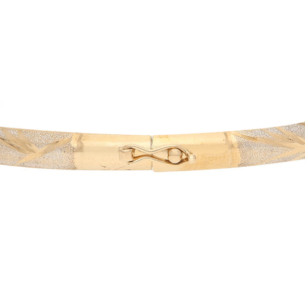Pulsera de arillo platinada en oro amarillo 14 kilates.