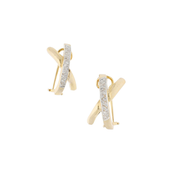 Aretes estilizados con diamantes en oro amarillo 14 kilates.