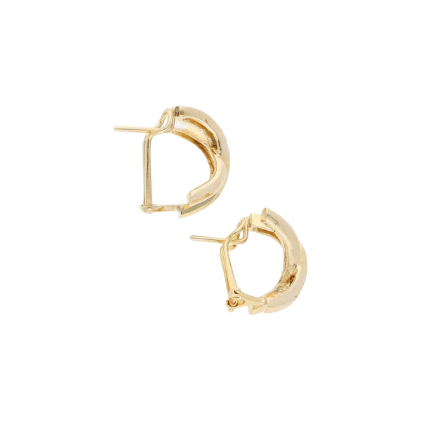 Aretes estilizados con diamantes en oro amarillo 14 kilates.