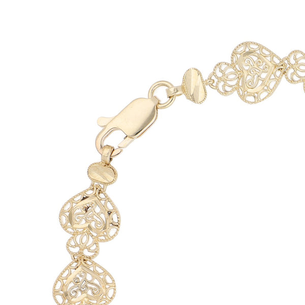 Pulsera eslabón calado motivo corazón en oro amarillo 14 kilates.