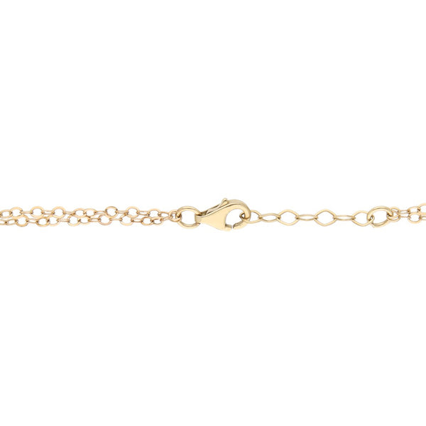 Pulsera de dos hilos eslabón combinado con colgantes en oro amarillo 14 kilates.
