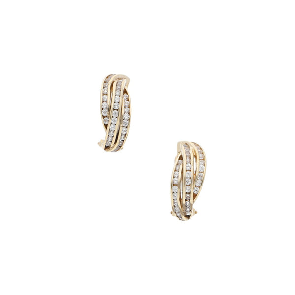 Aretes diseño especial con circonias en oro amarillo 14 kilates.