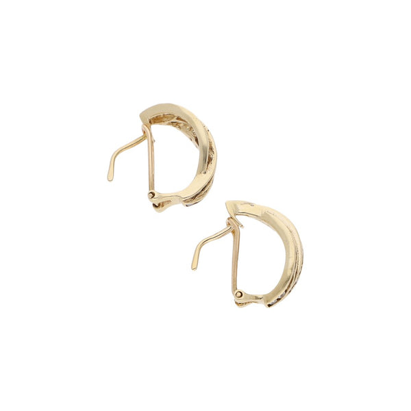 Aretes diseño especial con circonias en oro amarillo 14 kilates.