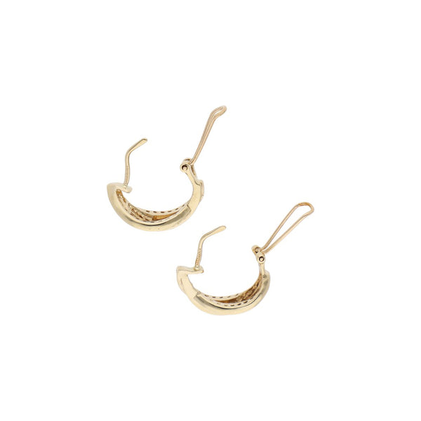 Aretes diseño especial con circonias en oro amarillo 14 kilates.