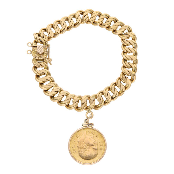 Pulsera eslabón encontrado con colgante y moneda de 5 pesos oro mexicano 21.6 kilates en oro amarillo 18 kilates.
