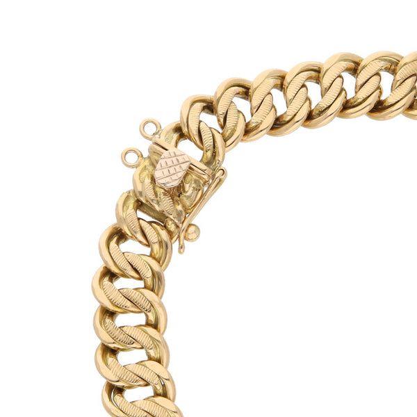 Pulsera eslabón encontrado con colgante y moneda de 5 pesos oro mexicano 21.6 kilates en oro amarillo 18 kilates.