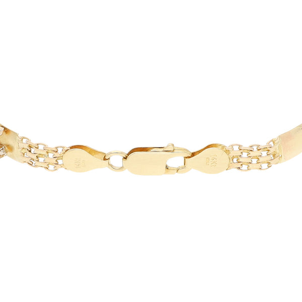 Pulsera eslabón articulado con motivo felinos en oro dos tonos 14 kilates.