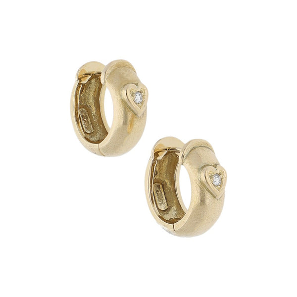 Arracadas articuladas con diamantes en oro amarillo 12 kilates.