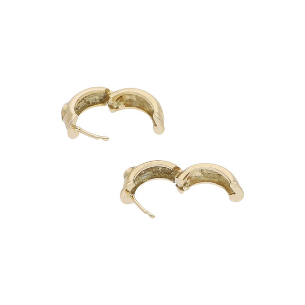Arracadas articuladas con diamantes en oro amarillo 12 kilates.
