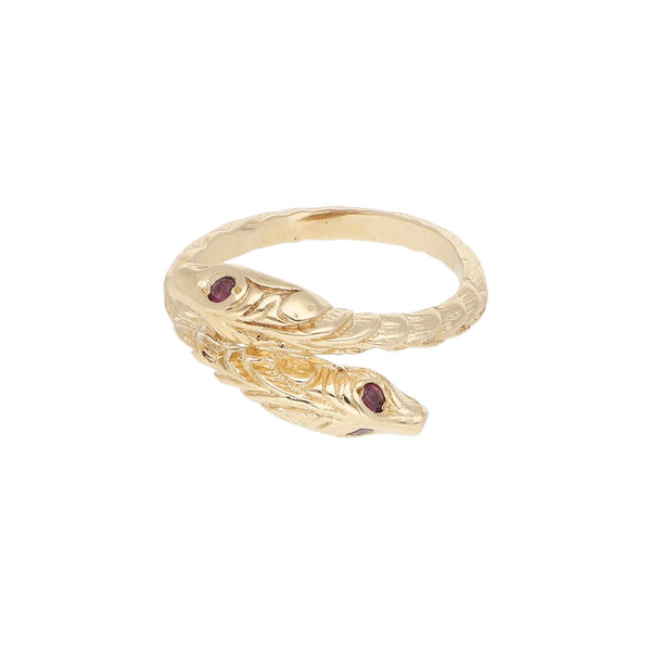 Anillo labrado motivo serpiente con sintéticos en oro amarillo 14 kilates.